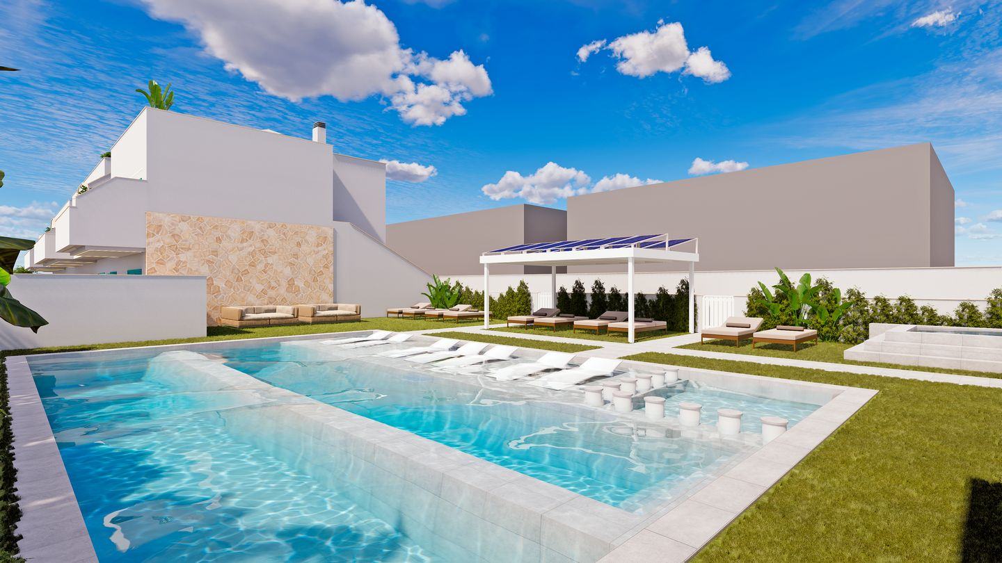 Zona común de piscina y tumbonas