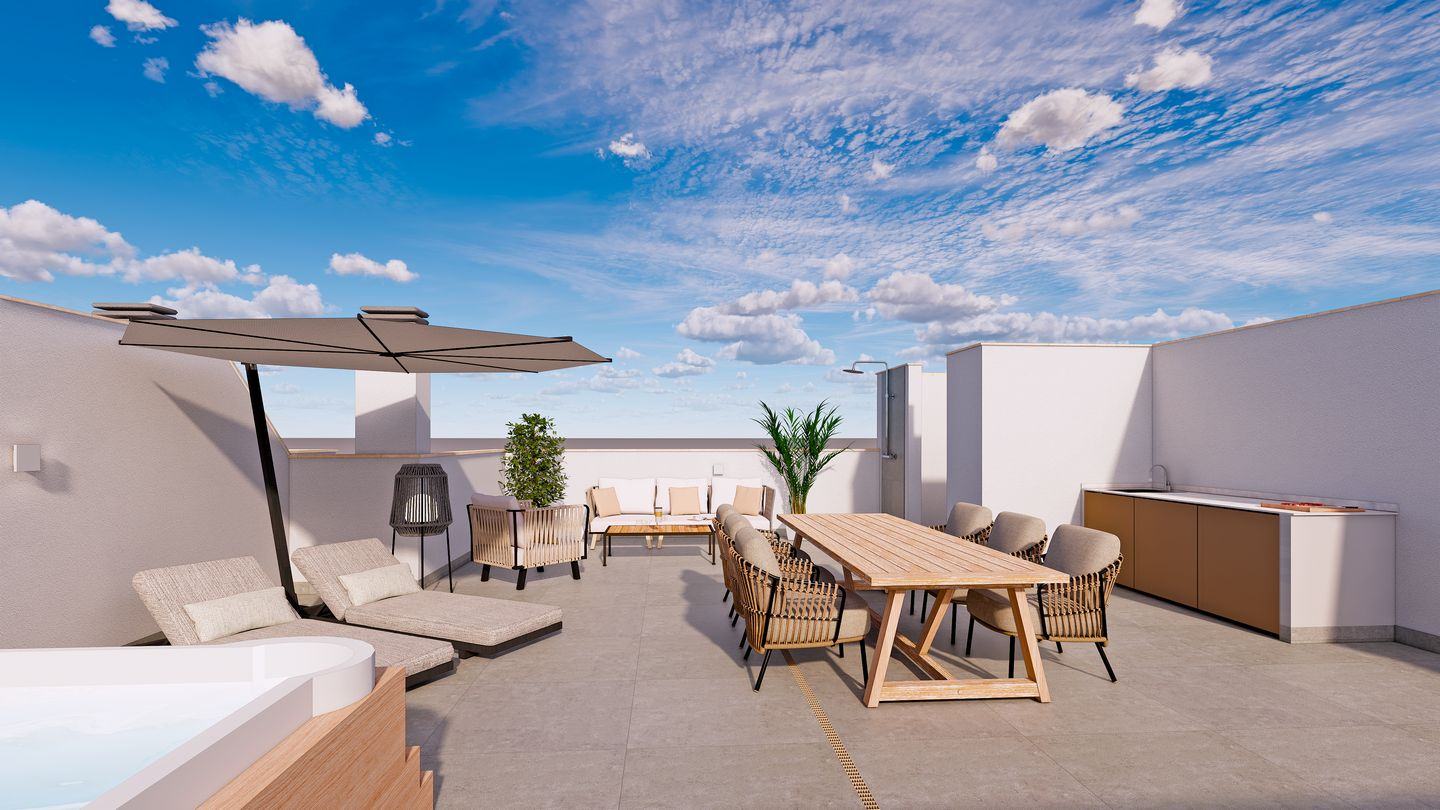 Solárium con jacuzzi y comedor exterior